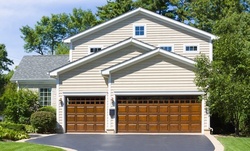 $99 for Garage-Door Repair with Roller Installation from Anco Overhead Door Service Inc ($280 Value)