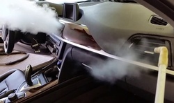 Power Steam Auto Detail Package at Ez Tint & Car Salon (Up to 58% Off). Three Options Available.