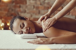 60-Minute Signature Massage or Signature Hydrating Facial at Enchanteria Day Spa (Up to 55% Off)