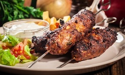 Chicken Kebab, Shawarma Platter, Chicken Shawarma, or Falafel Sandwich Combo at Falafel 'N' Café (Up to 50% Off)
