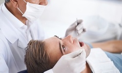 Dental Exam, Teeth Cleaning, X-Rays, and Optional Take-Home Whitening Kit at Island Dental Spa (Up to 63% Off)