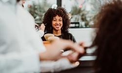 One Men's or Women's Haircut at Karol's International Hair Design (Up to 42% Off)