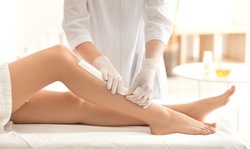 One Women's Full Legs and Optional Full Arms Waxing Session at 247 Natural Wellness Center (Up to 64% Off)