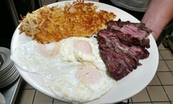 Breakfast Food & Drink at Our Place Cafe for Carryout from Our Place Cafe (Up to 30% Off). 2 Options Available.