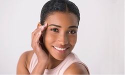 One Brow Wax with Optional Tinting at The Pampered Peach (Up to 50% Off)