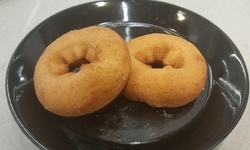 Donuts and Large Coffee or Fountain Drink at Big Daddy's (Up to 65% Off). Four Options Available.