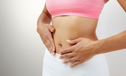 Colon Hydrotherapy Treatment with Optional Body Wrap at Peaceful Escapes Spa and Wellness Center (Up to 49% Off)