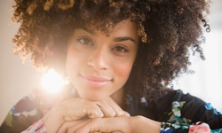 Consultation and Wash with Afro-Curl, Two-Strand Twist, or Perm-Rod Set Service at Unique Hair Salon (Up to 75% Off)