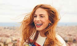 One Haircut, Shampoo, and Style with Optional Eyebrow Wax at The Perfect Touch at Legacy Salons (Up to 59% Off)