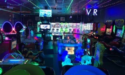 Game Tokens, VR Experience, and Bumper Cars at 4040 Arcade (Up to 61% Off). Four Options Available.