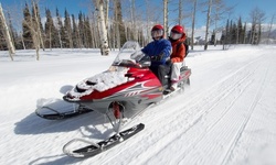 Half-Hour Beginner Snowmobile Tour or One-Hour or Longer Snowmobile Tour from Out Back Kayak (Up to 50% Off)
