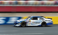 Three-Lap Ride-Along or Three-Hour Driving Experience from Mario Andretti Racing Experience (Up to 52% Off) 