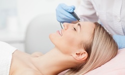 One or Three Dermaplaning Treatments with Brightening Vitamin C Mask at Cascades MedSpa (Up to 48% Off)