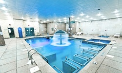 Spring Special: Admission for One, Two, or Four with Optional Body or Foot Massage at Spa World (Up to 43% Off)