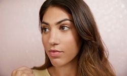 $48.75 for One Custom Facial at Charm Hair and Skin Salon ($130 Value)