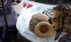 Mad Hatter Afternoon Tea at Alice's Tea Cup (Up to 7% Off)