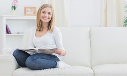 Dental Cleaning, Exam, X-Rays, Fluoride, and More at Tyson Smiles (Up to 84% Off). Three Options Available.