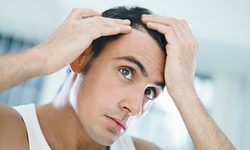 2, 4, or 8 Laser Hair-Regrowth Treatments at New Image Anti Aging & Cosmetic Laser Center (Up to 32% Off) 