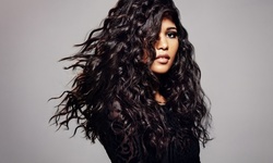 Microbead, Tape-In, or Hand-Tied Hair Extensions Installation at Color By Courtney (Up to 35% Off)