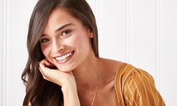 $49 for Implant Abutment and Implant Crown at Comfort Dental Center ($3,240 Value)