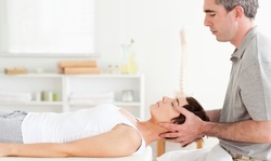 Initial Exam with One Adjustment or Four Additional Adjustments at Ryan Chiropractic and Wellness (Up to 69% Off)
