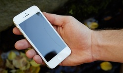 Glass or Battery Repair for iPhone Models at Teddy's Cell Phone Repair (Up to 52% Off). Seven Options Available.