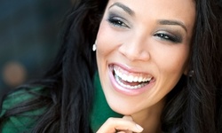 $64.40 for an In-Office Zoom! Teeth Whitening and Exam at The Dr. Richard E. Betor Cosmetic Dental Group ($550 Value)