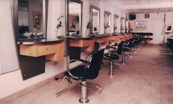 Color Touch-up, Blowout, or Haircut with Optional Full Highlights at Pilo Arts Salon (Up to 60% Off) 