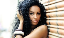 Haircut w/ Optional Curling and Relaxer at Kenesha Watkins Hair Parlor (Up to 36% Off). Three Options Available.