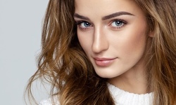 Blow- Out with Haircut and Balayage or Partial Highlights at Kristi's Hair Studio (Up to 53% Off)