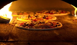 One Two Liter Of Soda With Purchase Of A Large Pizza Pie at Elegante Pizzeria 