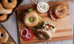 Bagels at Queens Bagels and Delicatessen (Up to 25% Off). Two Options Available.