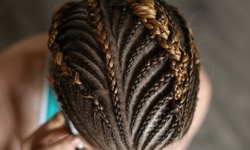 Dreadlock Retwist, Cornrows with Optional Extensions at Braids and Weaves Experts (Up to 43% Off)