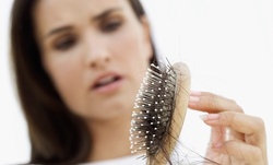 Hair Restoration for Hair Up to 5 Inches or 6-12 Inches at Hair Qwest (Up to 38% Off)