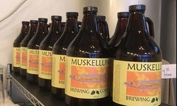 Beer Flight w/ Empty Growler & 10% Off Merchandise for 1, 2, or 4 at Muskellunge Brewing Company (Up to 50% Off)