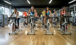 Unlimited Spinning or Indoor Sculpt Classes for One or Two Months at Powerhouse Gym (Up to 57% Off)