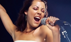 Two or Four 25-Minute Voice Lessons at Heart of Singing (64% Off)