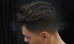$8 for Men's Haircut at Paul Mitchell Barber School - Arlington ($13 Value)