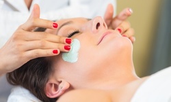 One or Two 60-Minute Exfoliating Facials at The Glow Factory  (Up to 74% Off)