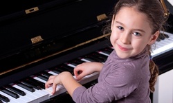 Four or Eight 30-Minute Weekly Music Lessons at The Music Academy (48% Off)