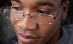 Eye Exam and $225 Towards Eyeglasses at Ultimate Eye Wear (Up to 91% Off)