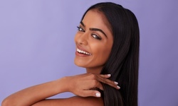 One or Two Silk Presses at Hairdoctor516 (Up to 43% Off)