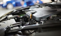 Oil Change with Optional Tire Rotation at PM Standley Motocars (Up to 54% Off). Three Options Available.