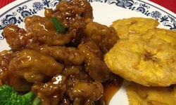 Food and Drink for Takeout and Dine-In if Available at El Flamboyan (Up to 27% Off)