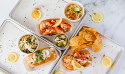 Dine In or Carry Out Seafood at The Dock (Up to 39% Off). Two Options Available.