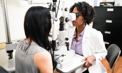 Eye or Eye and Contact Exam with Value Toward Glasses and Lenses at Eye To Eye Optical Center (Up to 97% Off)