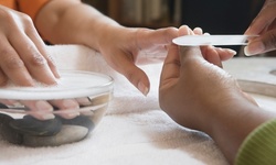 One Regular Mani-Pedi or Gel Manicure with Regular Pedicure at Cosmopolitan Hair & Nail Spa (Up to 34% Off)
