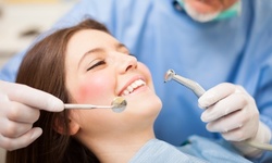 Dental Exam, Bitewing X-Rays, and Cleaning or Scaling with Irritation at Las Colinas Dental Care (Up to 89% Off)