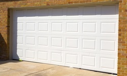 Garage Door Tune-Up with Safety Inspection, Rollers from Texan American Overhead Door Company (Up to 83% Off)