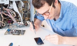 iPhone or iPad Screen Repair at FastFix Electronics (Up to 82% Off). 13 Options Available.